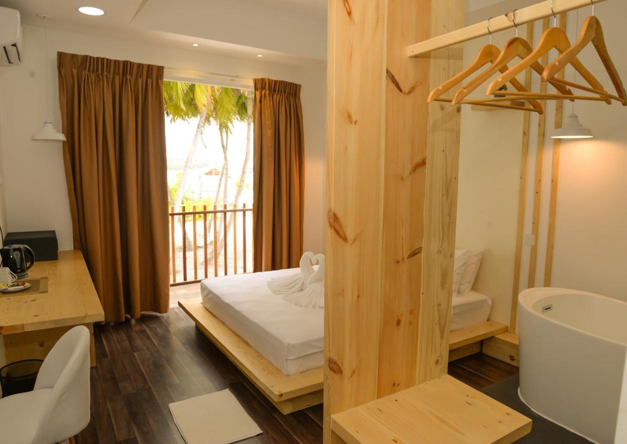 Portia Hotel&Spa Dhiffushi Esterno foto